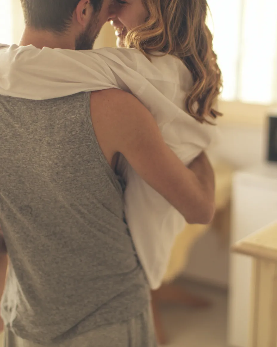 A couple at home, close and unhurried